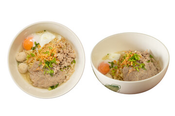 Appetizing Asian Noodles: Two bowls of Asian noodles with meatball, egg and garnish, a culinary delight.