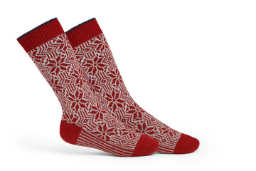 Red and White Snowflake Patterned Winter Socks Isolated on White Background