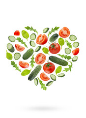 Fresh vegetable heart shape. Salad ingredients - red tomatoes, green cucumbers, greens -  fly as heart shape, isolated. Wholesome, vitamin ingredient for antioxidant salads, healthy dietary menus.