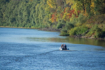 Fototapeta premium father and son on the river