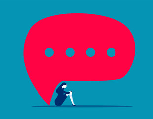 Sad. Businessman sitting under speech bubbles.