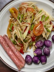 spicy papaya with black crab Thailand called farmer crab and fresh shrimp that is famous of Thailand Steer food. Select and soft focus.