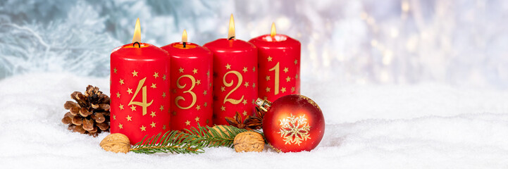 Fourth 4th Sunday in advent Christmas time panorama copyspace copy space with burning candle snow winter