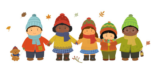 Joyful multicultural children hand in hand in Autumn
