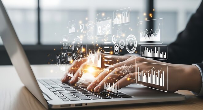 Person typing on laptop with holographic data charts and graphs overlay analytics statistics