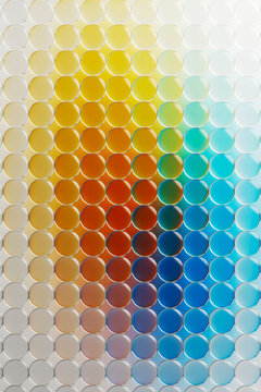 Rows of glowing glass shapes gradient 3D