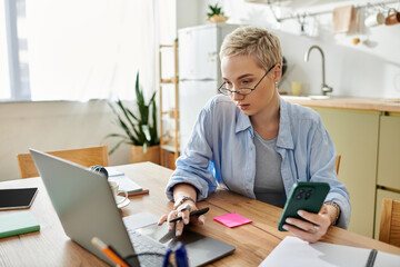 Young woman works creatively at home, balancing technology and tasks with focus and beauty