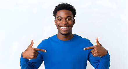 Happy young African American man pointing at himself smiling confident self esteem proud joyful success achievement positive attitude lifestyle portrait