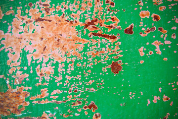 rusty old green metal background with some spots and stains on it