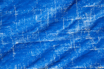 Blue crumpled fabric texture. Abstract background and texture for design.