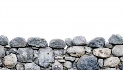A rustic stone wall made of variously shaped and sized rocks. natural textures and colors. set against a bright white background. ideal for architectural or nature-themed projects