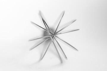 Abstract Wire Whisk Shape on White. Minimal abstract wire whisk composition on white background, modern kitchen or geometric concept.