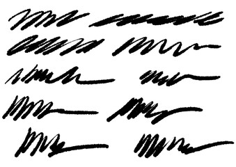 Collection of abstract black brush strokes, scribbles, and doodles on a white background
