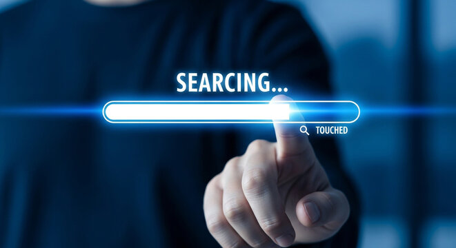 A finger touches a virtual loading bar on a screen with the word searching, representing data processing and progress