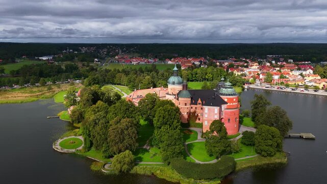 Aerial Shot of historic Gripsholm Castle in Sweden, Drone Flying Over Tranquil Lake towards a royal Swedish castle, tourism in Mariefred, Sweden