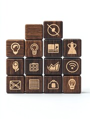 Wooden blocks with engraved icons, representing ideas and concepts.