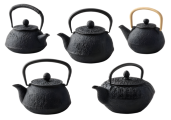 Cast iron teapots collection displayed in matte black finish, traditional rounded shapes with curved handles shown in multiple angles, isolated presentation with elegant set for tea concept