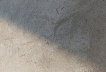 Beige Concrete Wall Texture with Subtle Shadows