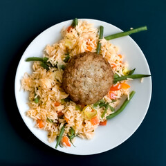 Frikadelle German Pan Fried Meatball with Basmati Rice, Green Peas, Bell Peppers and Onions