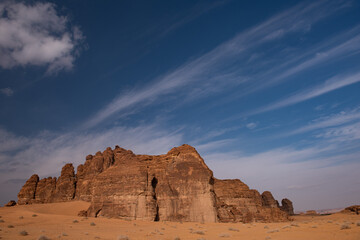 Very dramatic clouds and rock formations in the desert near Al Ula in Saudi Arabia