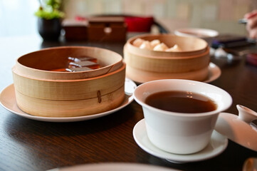Various dim sum on the table. Yum Cha scene. Traditional and common food in Yam Cha Culture....