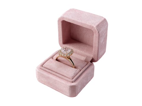Pink velvet ring box with diamond engagement ring jewelry box isolated on a transparent background in PNG format. - Powered by Adobe