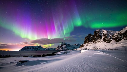 Aurora borealis over snowy landscape