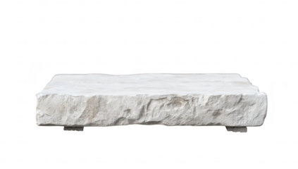 A textured. rectangular stone slab rests on a gray tiled surface. surrounded by a rustic stone wall. creating a serene outdoor setting ideal for landscaping or architectural design