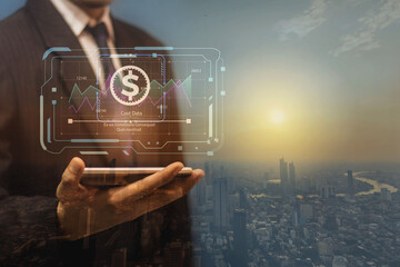 A businessman uses the internet on his mobile phone to display cost and profit data in a virtual screen graph.