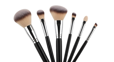 A professional cosmetic makeup brush set with various applicators for foundation, powder, and eyeshadow, isolated on a clean white background
