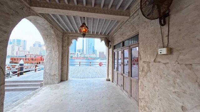 Dubai, UAE, 28.05.2025. Al Seef Dubai Creek historical heritage Area or Dubai Old City and Al Seef Marine boats Yacht. Vintage Vibe of the traditional arab architecture p2