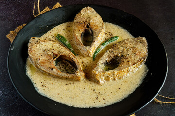 Ilish Macher Noni Bahar | Fusion Bengali Hilsa Curry with Coconut Cream, Black Pepper and Butter | Rich Continental Inspired Ilish Fish Recipe Served with Rice
