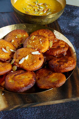 Taler Malpua | Traditional Bengali Sweet Pancakes Made with Palm Fruit and Jaggery, Fried and Soaked in Sugar Syrup | Authentic Bengali Dessert for Festivals and Special Occasions

