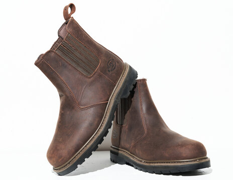 Kent, uk 01.01.2025 Dickies Rawhide Dealer Chelsea Boots Brown Leather SBP HRO SRA Work Safety boots. Construction and labour shoes and footwear.