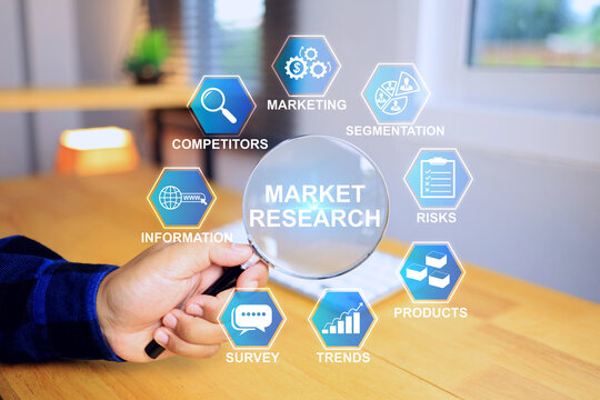 market research concept with a hand using magnifying glass to search a factor of marketing to data summary and business planning the systematic process analyzing data market