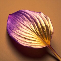 A vibrant leaf, gold and purple