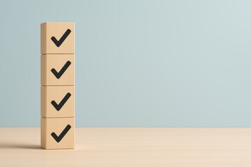 Stacked wooden blocks with checkmarks on a minimalistic background for goal achievement themes