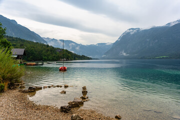 Beautiful mountain landscape with pure water lake in the Julian Alps, Lake Bohinj, Slovenia.