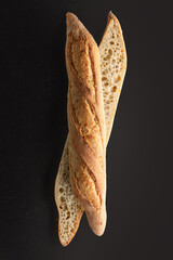 Crusty Baguette Slices On Dark Background Fresh Bakery Sourdough Bread Close-Up For Food Photography