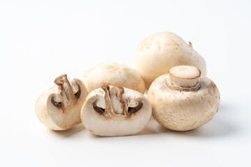 Fresh Organic Champignon Mushrooms on White Background, Healthy Eating Concept