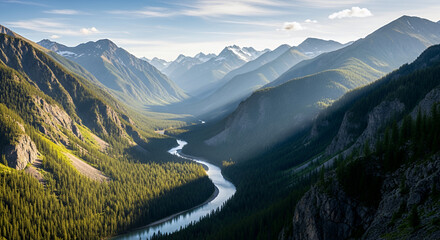 Aerial view of a winding river flowing through a valley surrounded by mountains and dense forest land