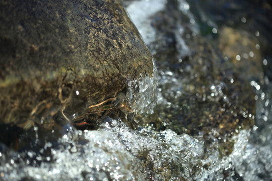 Spray of water in a small river