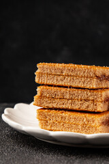 Biscuit cake portion filling jam sweet dessert cake natural product tasty snack fresh delicious gourmet food background on the table rustic top view copy space