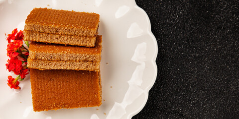 Biscuit cake portion filling jam sweet dessert cake natural product tasty snack fresh delicious gourmet food background on the table rustic top view copy space