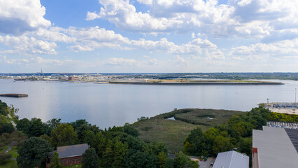 Aerial shot of factories and warehouses along the Patapsco River in Baltimore Maryland USA