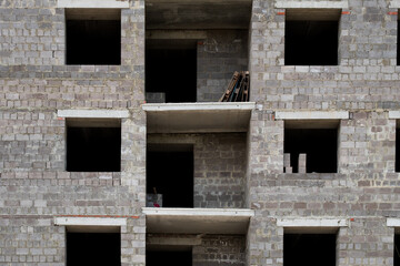 construction of new real estate and living spaces, an apartment building without decoration