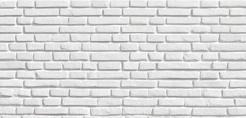 Fototapeta premium A seamless image of a white brick wall texture, showing a repeating pattern of uniformly sized bricks with subtle shading variations