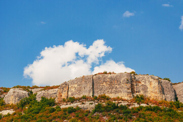 Rural landscape with mountain at summer on blue sky background
