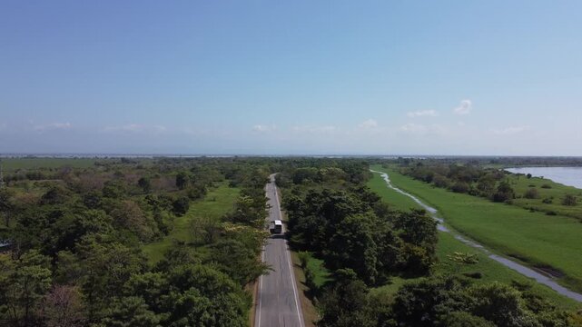 Road middle forest moning Cienaga Colombia lakes sky blue clear river 4k
