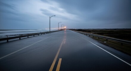Dramatic coastal road scene at sunset with atmospheric sky and ocean waves